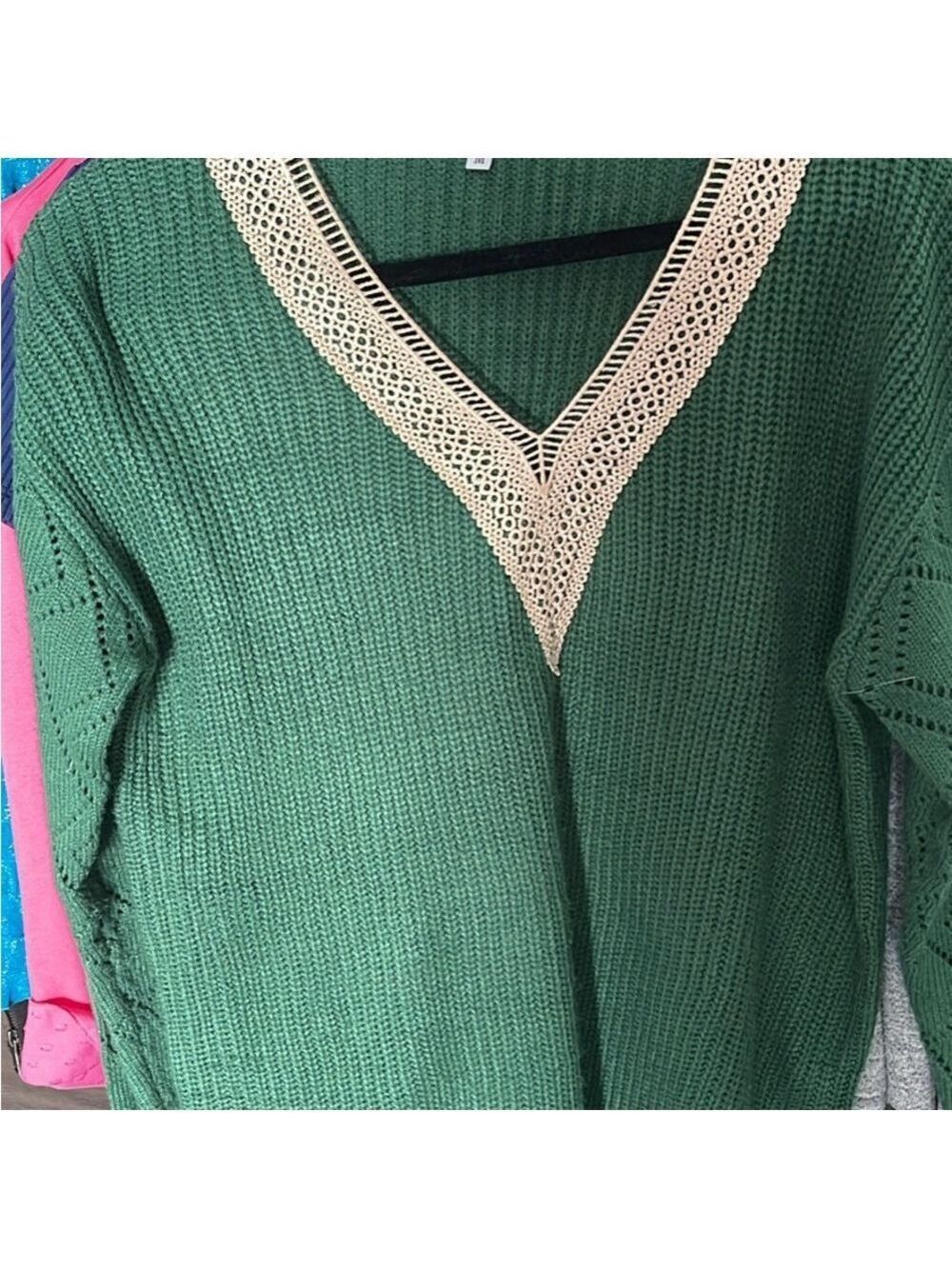 Nice green sweater with off white lace at v neck